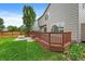 Spacious wood deck perfect for outdoor entertaining in the lovely backyard with lawn at 3528 Morning Glory Dr, Castle Rock, CO 80109