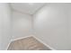 Small, neutral-colored bedroom featuring neutral carpet and white walls at 3528 Morning Glory Dr, Castle Rock, CO 80109