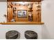 Close up view of basement bar showcasing unique decor and finishes, great for entertaining guests at 6080 S Detroit St, Centennial, CO 80121