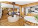 Bright living room features wood floors and a unique fireplace at 6080 S Detroit St, Centennial, CO 80121
