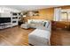 Comfortable living room with hardwood floors, gray sofa, and decor elements at 6080 S Detroit St, Centennial, CO 80121
