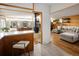 Bright open-concept living area with wood flooring, white countertops, and stylish decor at 6080 S Detroit St, Centennial, CO 80121