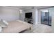 Cozy bedroom with balcony access and a relaxing ambiance at 7201 E Quincy Ave # 103, Denver, CO 80237