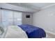 Bedroom with a big window providing natural light at 7201 E Quincy Ave # 103, Denver, CO 80237