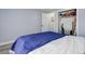 Bedroom showcasing natural light, a closet and clean lines offering a serene retreat at 7201 E Quincy Ave # 103, Denver, CO 80237