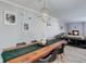 Charming dining area with wood table, fireplace, and comfortable seating at 7201 E Quincy Ave # 103, Denver, CO 80237