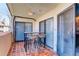 Relaxing outdoor patio area perfect for dining with table and chairs at 7201 E Quincy Ave # 103, Denver, CO 80237