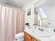 Well lit bathroom includes a skylight at 7899 E 28Th Pl, Denver, CO 80238