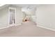 Large carpeted bonus room includes a fun pink play tent at 7899 E 28Th Pl, Denver, CO 80238