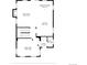 A first-floor blueprint featuring a living room, kitchen, breakfast nook, and formal dining area at 7899 E 28Th Pl, Denver, CO 80238