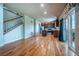 Open-concept kitchen with stainless steel appliances, wooden cabinets, and island at 1873 Trevor Cir, Longmont, CO 80501