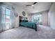 Spacious main bedroom with vaulted ceiling, natural light, and plush carpet at 1873 Trevor Cir, Longmont, CO 80501