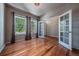 Bright office space with hardwood floors, large windows, and glass paneled doors at 1873 Trevor Cir, Longmont, CO 80501