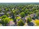 Residential neighborhood aerial view showcases mature trees, well-maintained homes and manicured lawns at 8035 S Garfield Way, Centennial, CO 80122