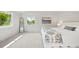 Serene main bedroom featuring a large window, carpet, and light, airy decor at 8035 S Garfield Way, Centennial, CO 80122