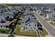 An elevated view shows a modern and scenic community with mountain views at 11246 Bellsong Ln, Littleton, CO 80125