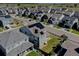 This aerial view showcases a community with sustainable homes, incorporating solar panels at 11246 Bellsong Ln, Littleton, CO 80125