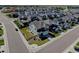 This aerial shot displays a well-designed community with modern homes near open land at 11246 Bellsong Ln, Littleton, CO 80125