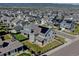 A high-angle view of a well-maintained neighborhood nestled near scenic mountains at 11246 Bellsong Ln, Littleton, CO 80125
