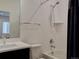 Clean bathroom featuring white countertops and subway tile with chrome fixtures at 11246 Bellsong Ln, Littleton, CO 80125