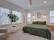 Serene bedroom with large windows, a comfortable bed, and modern decor at 11246 Bellsong Ln, Littleton, CO 80125