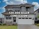 Charming two-story home with a two-car garage and inviting front porch at 11246 Bellsong Ln, Littleton, CO 80125