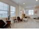 Bright and airy living room with large windows and modern furnishings at 11246 Bellsong Ln, Littleton, CO 80125