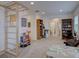 Spacious playroom with natural light and various play structures at 11246 Bellsong Ln, Littleton, CO 80125