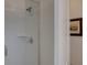 Stylish shower with subway tile, glass door, and chrome fixtures at 11246 Bellsong Ln, Littleton, CO 80125