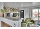 Stylish living room featuring a breakfast bar and modern decor, adding a unique touch at 7001 Alan Dr, Denver, CO 80221