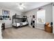 Charming bedroom with bunk beds, window and playful decor, perfect for a room at 6236 S Millbrook Way, Aurora, CO 80016