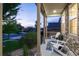 Charming front porch with stone accents, rocking chairs, and picturesque neighborhood views at 6236 S Millbrook Way, Aurora, CO 80016