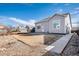 Spacious backyard with low-maintenance landscaping and a private fenced perimeter at 11499 Kenton St, Commerce City, CO 80640