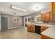 Spacious eat-in kitchen with modern appliances and outdoor access at 406 Titan Ct, Aurora, CO 80011