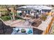 Aerial shot showcasing the backyard's multiple seating areas, gazebo, and garden beds at 6045 S Cook St, Centennial, CO 80121