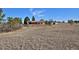 A vast, grassy field complements this single-story house, solar panels, and fenced-in areas at 1340 Deerpath Trl, Franktown, CO 80116