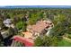 Expansive property features a tennis court, lush trees, and stunning home at 45 Charlou Cir, Cherry Hills Village, CO 80111