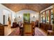 Formal dining room featuring a brick barrel ceiling, large table with seating for eight and a stylish area rug at 45 Charlou Cir, Cherry Hills Village, CO 80111