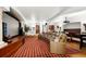 Home theater features tiered seating, a large screen, and a projector for an immersive experience at 45 Charlou Cir, Cherry Hills Village, CO 80111
