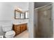 Bathroom with vanity, shower, and tiled walls at 3142 Uvalda St, Aurora, CO 80011