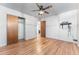 Bedroom with wood floors and a large closet at 3142 Uvalda St, Aurora, CO 80011