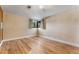 Bright bedroom with wood floors and a ceiling fan at 3142 Uvalda St, Aurora, CO 80011