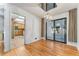 Dining room with hardwood floors and chandelier at 3142 Uvalda St, Aurora, CO 80011