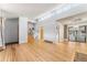 Open living room and dining area with hardwood floors at 3142 Uvalda St, Aurora, CO 80011