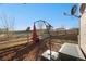 Backyard with barbecue, outdoor umbrella, and wooden fence at 3829 Odessa St, Denver, CO 80249