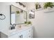 Bathroom with vanity, mirror, and natural light at 3829 Odessa St, Denver, CO 80249