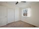 Bedroom with neutral carpet, closet, and window with natural light at 3829 Odessa St, Denver, CO 80249