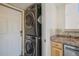 Conveniently placed laundry area featuring a stackable washer and dryer at 3829 Odessa St, Denver, CO 80249