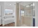 Bathroom featuring a glass-enclosed shower and separate soaking tub at 4305 W 118Th Pl, Westminster, CO 80031