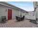 Deck with an outdoor dining set and gray-painted walls at 4305 W 118Th Pl, Westminster, CO 80031